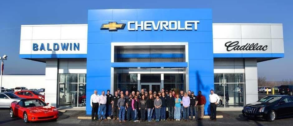 Baldwin Chevrolet Staff Image Infront Dealership